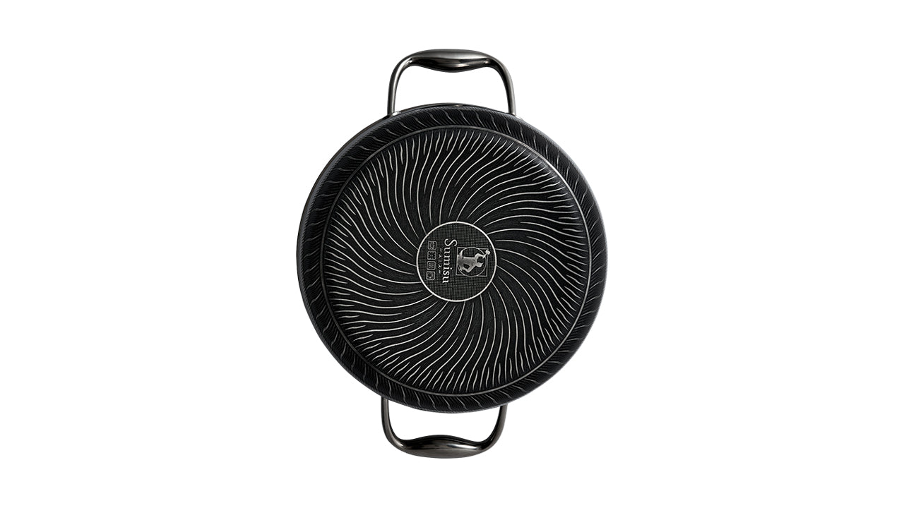 Bagside på non-stick Fusion gryde. Tåler metalredskaber og opvaskemaskine